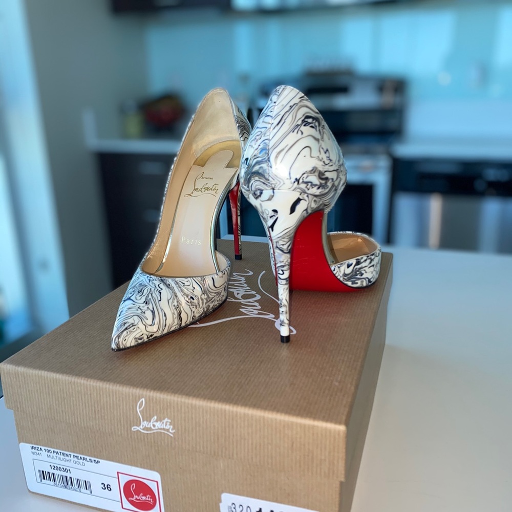 LOUBOUTIN red bottom heels